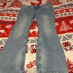 H&M Women's Flare Blue Jeans with stretch.